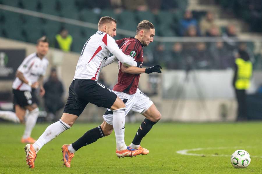 Rafal Augustyniak and Jan Kuchta during the UEFA Conference League match between Legia Warsaw and Sparta Prague