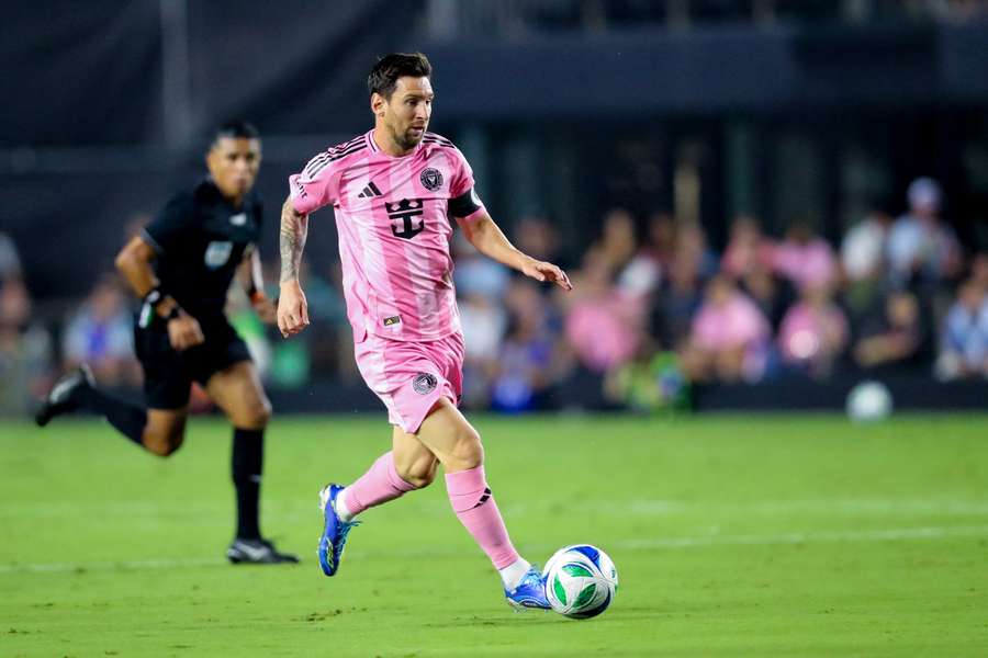 Lionel Messi controls the ball during a match against the Seattle Sounders