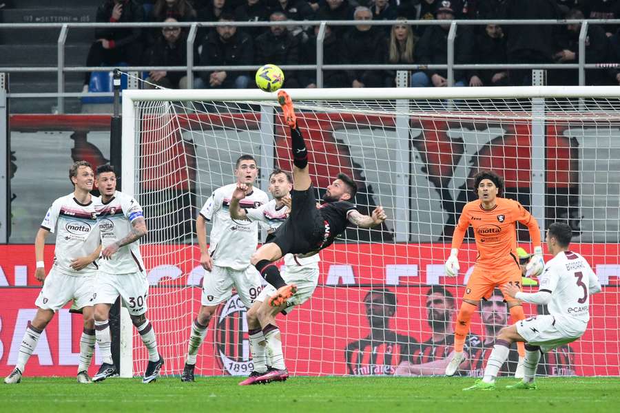 Olivier Giroud goes for an overhead kick against Salernitana