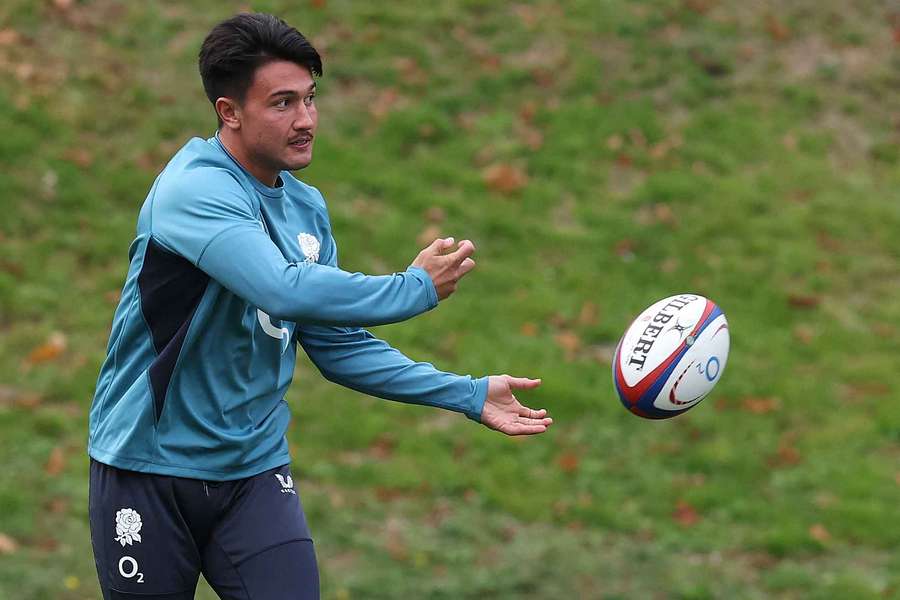 Marcus Smith passes the ball during the England training session 