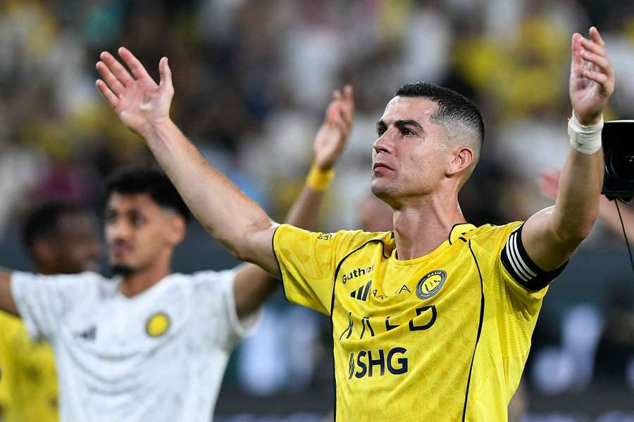 Al Nassr's Cristiano Ronaldo celebrates after a match