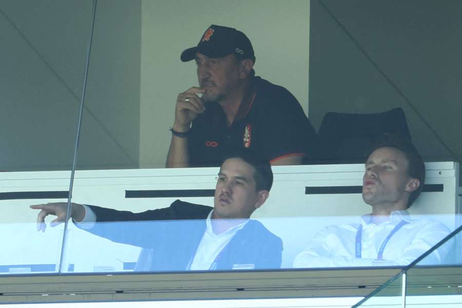 Suspended Brisbane Roar head coach Michael Valkanis watches on from behind glass at AAMI Park on Saturday.