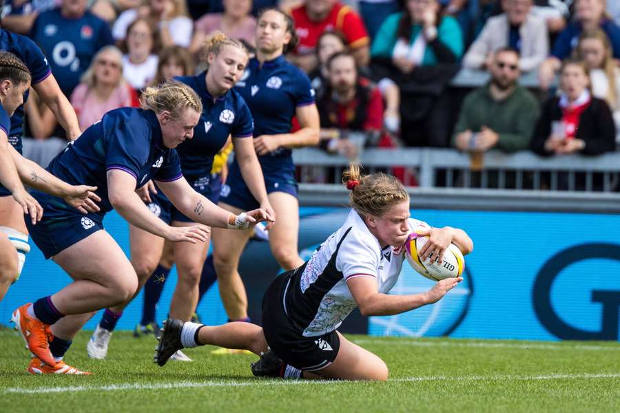 Canada's Tuttosi scores a try against Scotland