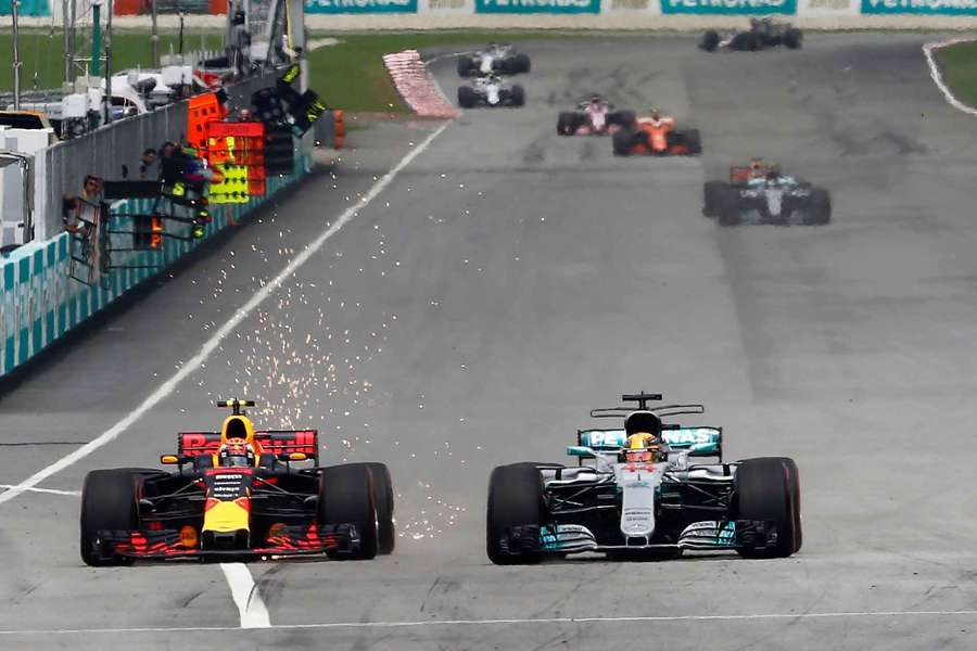Max Verstappen battles Lewis Hamilton at the 2017 Malaysian Grand Prix Max Verstappen battles Lewis Hamilton at the 2017 Malaysian Grand Prix