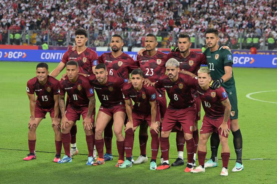 Players of Venezuela pose for a team photo before the start of the 2026 FIFA World Cup South American qualification football match with Peru