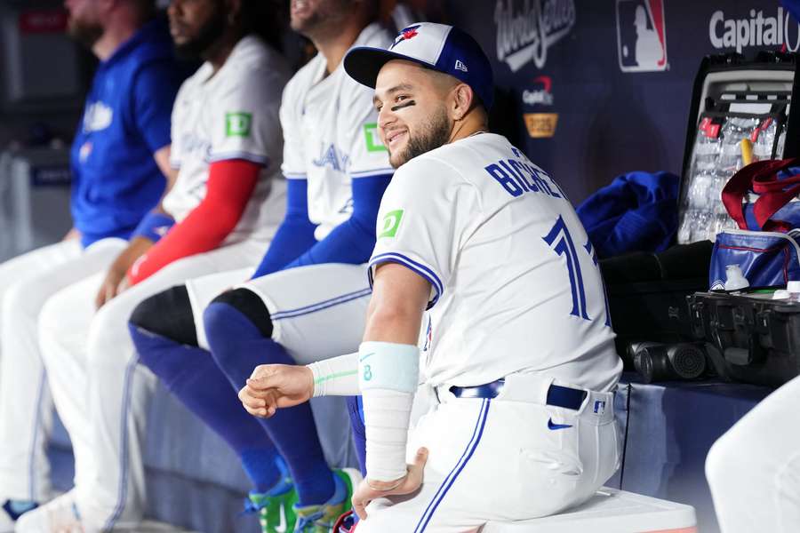 Bo Bichette smiles in the dugout (2025)