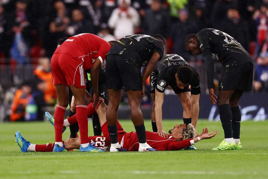 Hugo Ekitike after being injured in Liverpool's clash with PSG