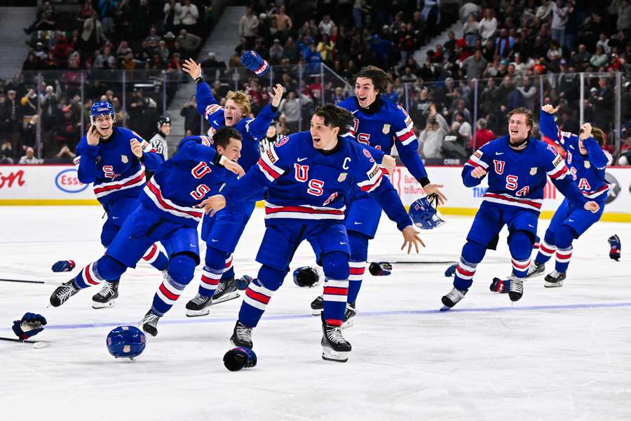 Team USA celebrates after winning the 2025 IIHF World Junior Championship