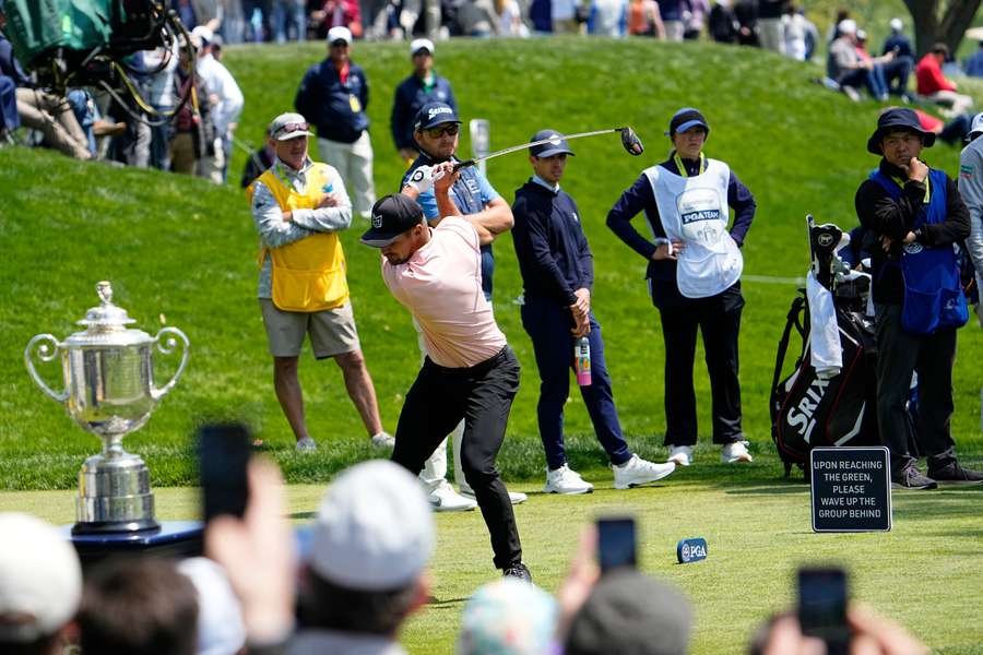 Bryson DeChambeau tees off on the 14th hole during the first round of the PGA Championship