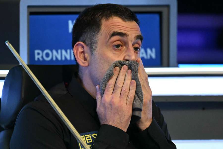 England's Ronnie O'Sullivan reacts in his chair during the Masters snooker tournament final