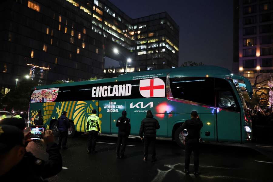 Mexican fans welcome England squad with jeers as ring of steel is formed by police