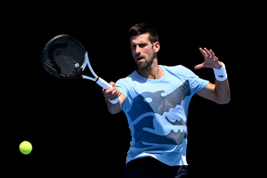 Novak Djokovic hits a return during a practice session ahead of the Australian Open