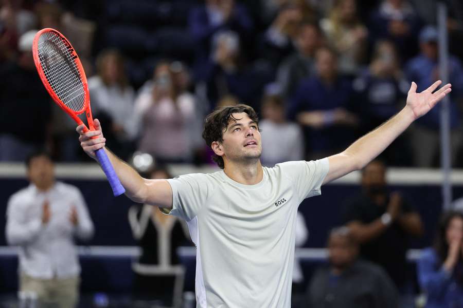 Taylor Fritz of the United States celebrates after defeating Marin Cilic in Dallas