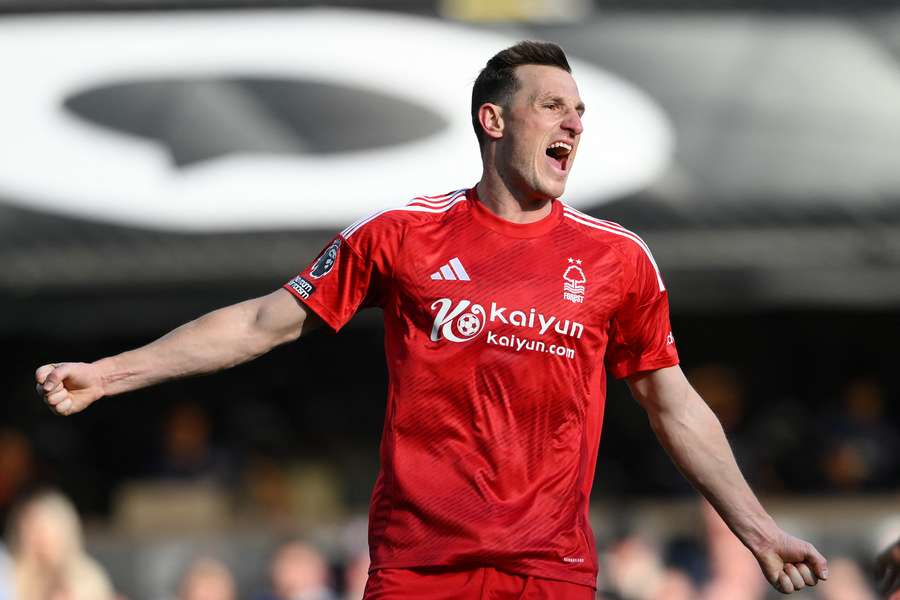 Chris Wood celebrates after teammate Anthony Elanga scores against Ipswich