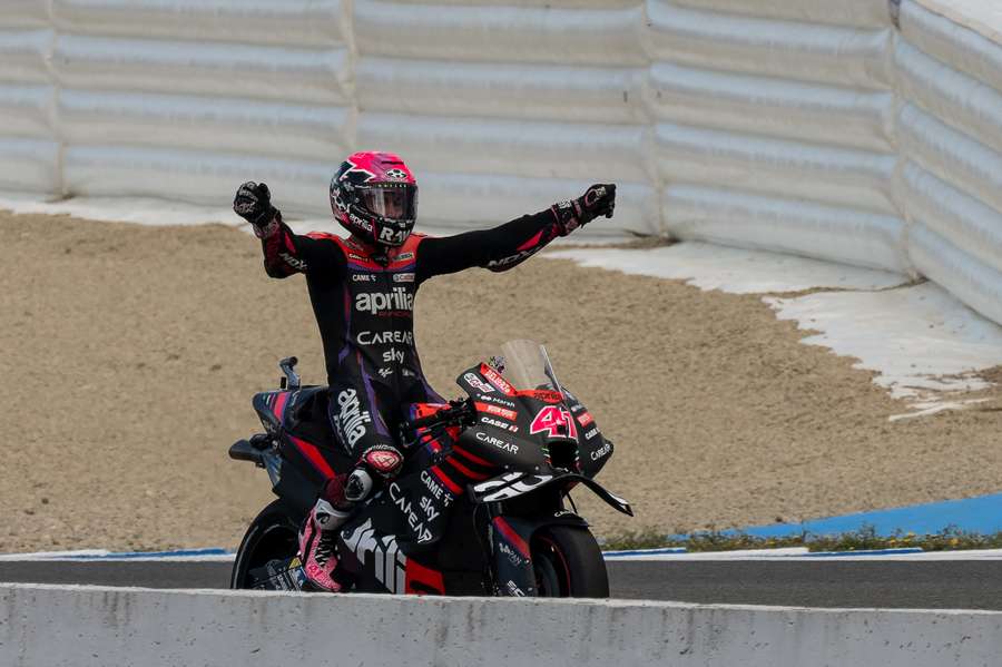 Aleix Espargaro celebrates after securing pole position in Jerez