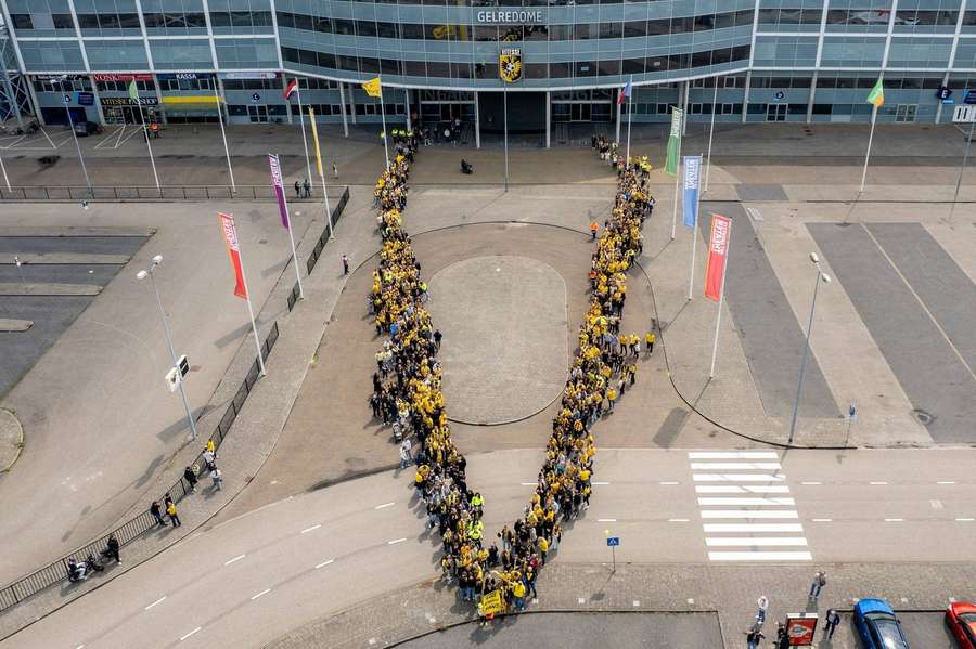 Vitesse fans formed a big 'V' in support of their club following the KNVB's decision to revoke the professional licence Vitesse fans formed a big 'V' in support of their club following the KNVB's decision to revoke the professional licence