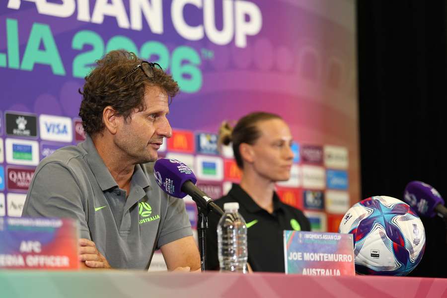 Joe Montemurro and Emily van Egmond speak to reporters on Monday.