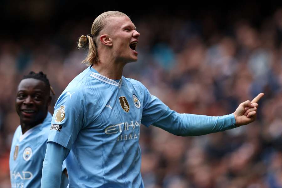 Manchester City's Norwegian striker #09 Erling Haaland celebrates scoring the opening goal 