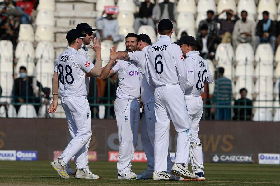 England's players celebrate their win