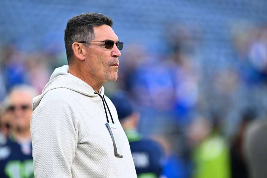 Ron Rivera standing on the sidelines before a game against the Seattle Seahawks