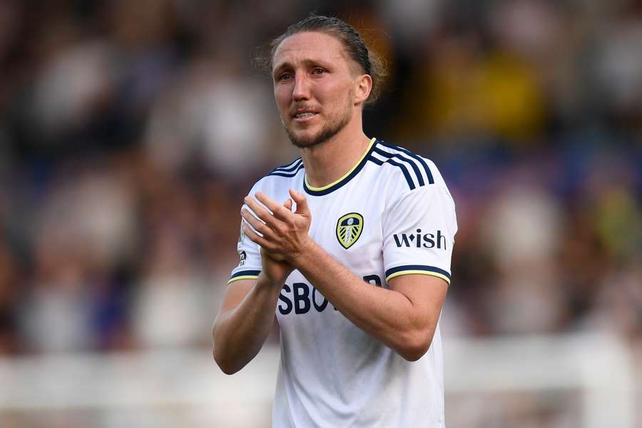 Leeds United's English defender Luke Ayling reacts to their defeat on the pitch