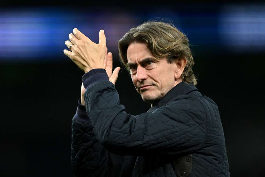 Spurs boss Thomas Frank applauds supporters after their win over Doncaster in the Carabao Cup last month