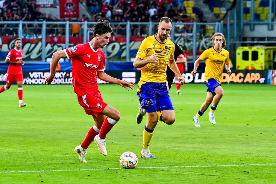 FC Twente's Lucas Vennegoor of Hesselink battling with Klemen Nemanic of Dunajska Streda FC Twente's Lucas Vennegoor of Hesselink battling with Klemen Nemanic of Dunajska Streda