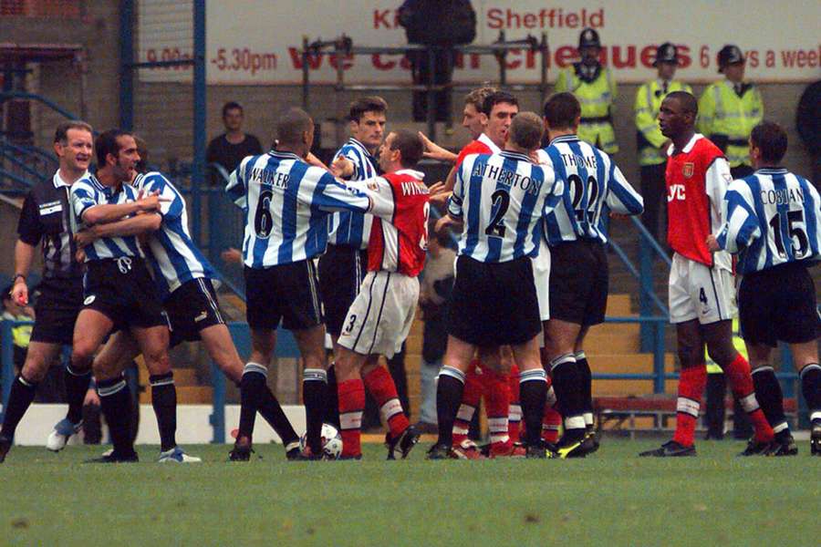 Paolo Di Canio shocked the football world by pushing over referee Paul Alcock when Arsenal visited Hillsborough in 1998