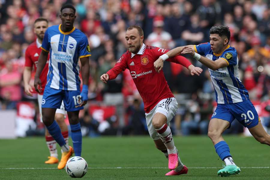 Brighton's Paraguayan striker Julio Enciso vies wioth Manchester United's Danish midfielder Christian Eriksen Brighton's Paraguayan striker Julio Enciso vies wioth Manchester United's Danish midfielder Christian Eriksen