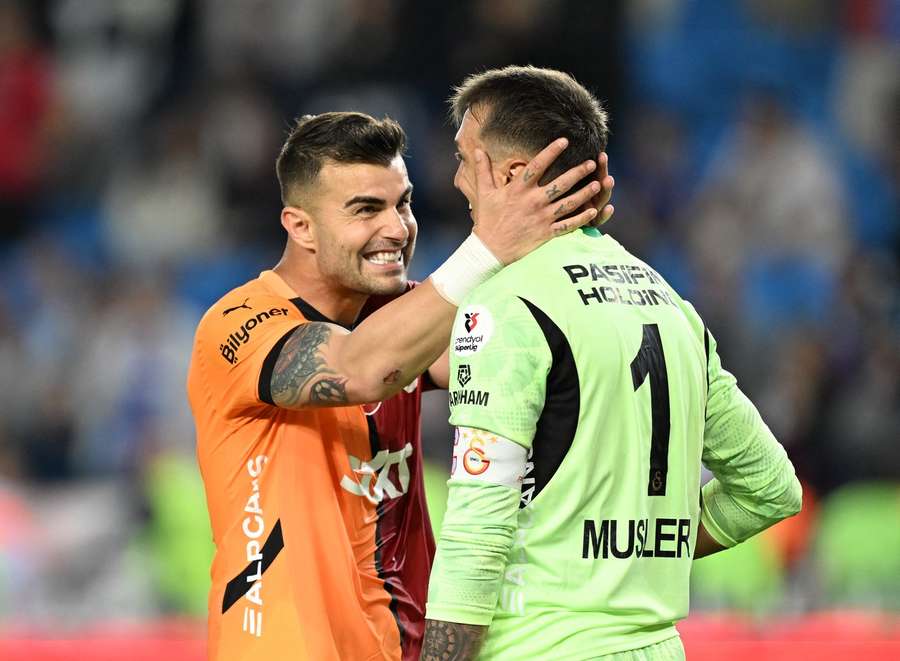 Abdulkerim celebrates with Muslera Abdulkerim celebrates with Muslera