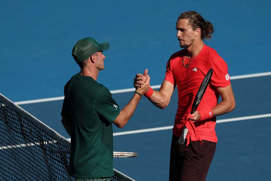 Zverev (right) shakes hands with Paul after his win