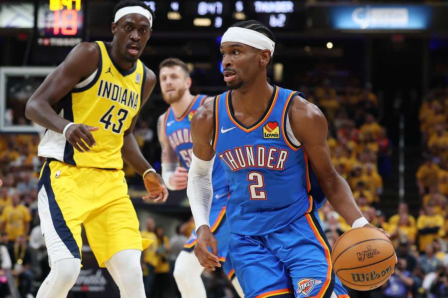 Shai Gilgeous-Alexander driving by Pascal Siakam in Game 4 of the 2025 NBA Finals