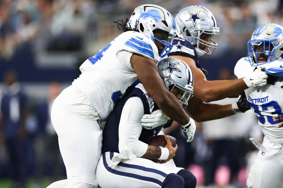 Lions defensive tackle Alim McNeill tackles Cowboys quarterback Dak Prescott Lions defensive tackle Alim McNeill tackles Cowboys quarterback Dak Prescott