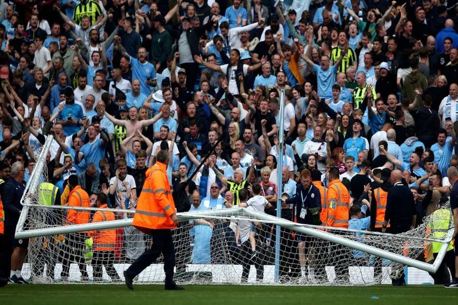 Manchester City fined £260,000 for pitch invasion after title win