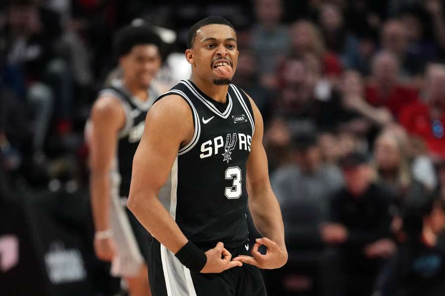 Keldon Johnson of the San Antonio Spurs reacts