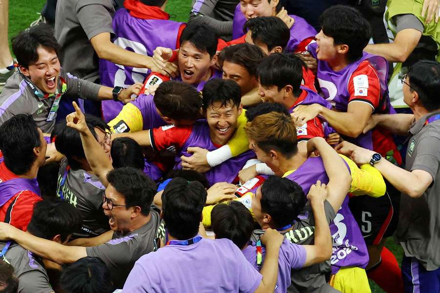 South Korea's Son Heung-min (centre) celebrates with teammates South Korea's Son Heung-min (centre) celebrates with teammates