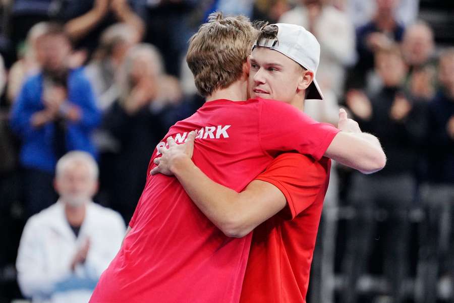 Holger Rune and Johannes Ingildsen hug it out after the doubles' win