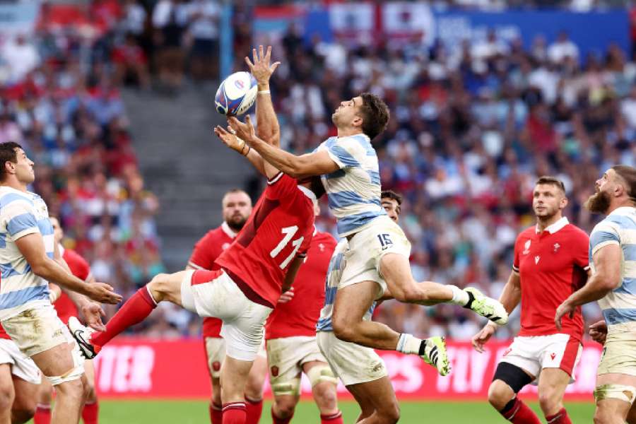 Wales' Josh Adams in action with Argentina's Juan Cruz Mallia