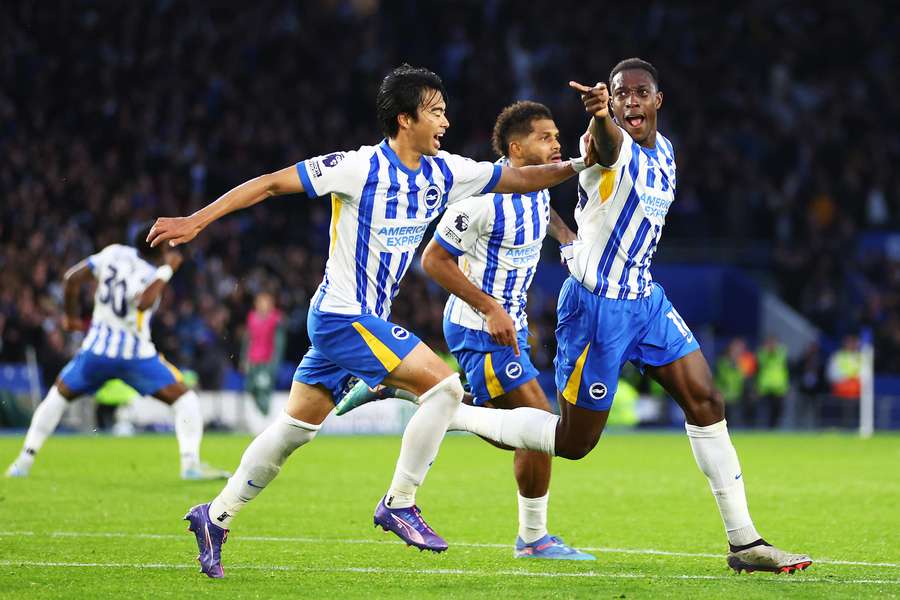 Danny Welbeck celebrates scoring Brighton's third goal against Tottenham