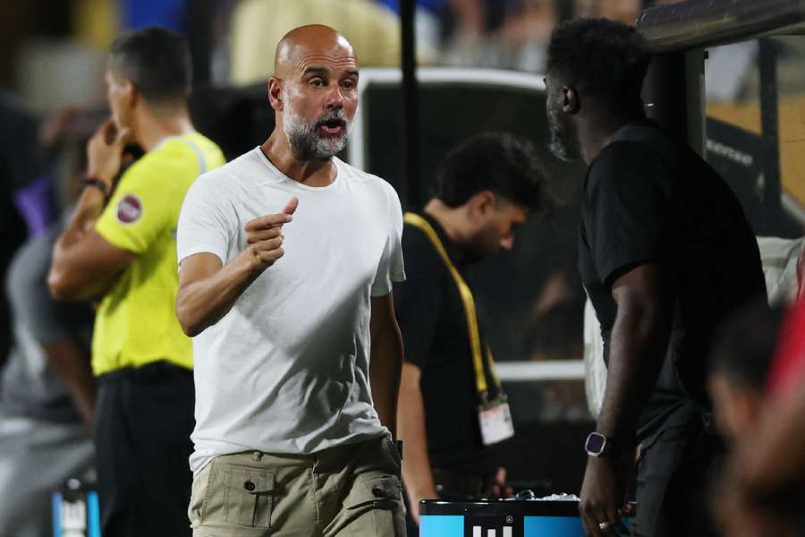 Guardiola fuming with the officials on the touchline