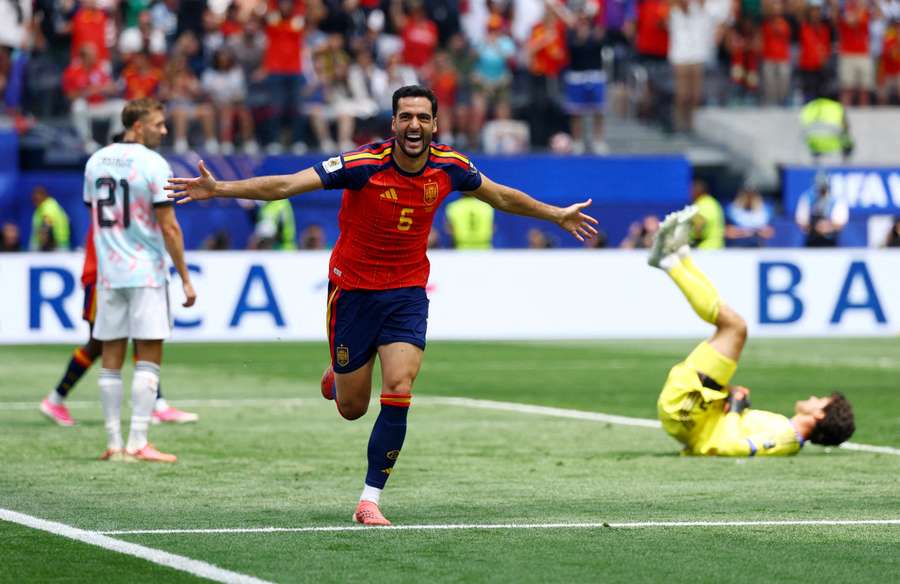 Spain's Mikel Merino celebrates scoring their second goal