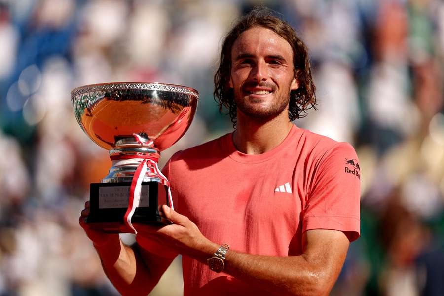 Stefanos Tsitsipas poses with the trophy after winning the Monte Carlo Masters