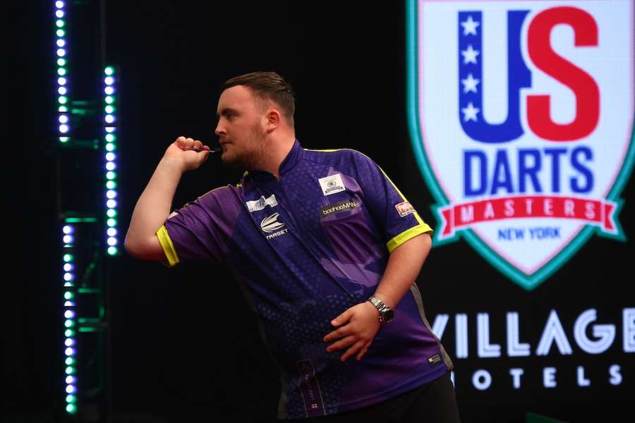 Littler in action at the Grand Slam of Darts