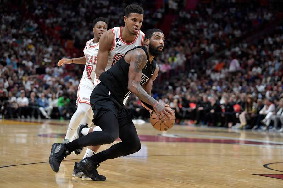 Nets sneak by Heat in final seconds