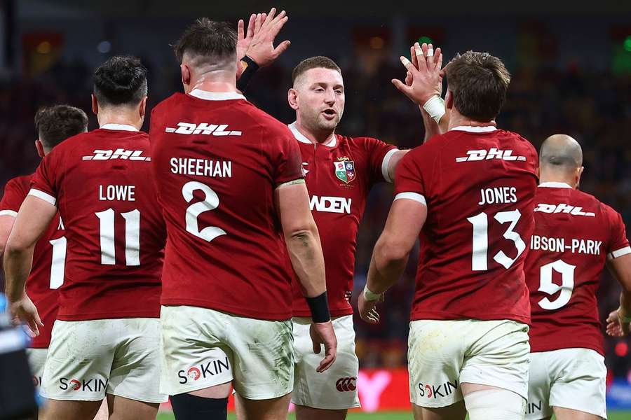 The Lions celebrate a huge win