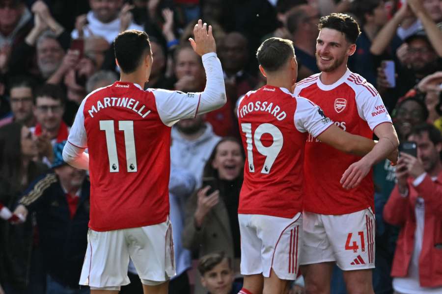 Declan Rice celebrates with teammates after scoring the opening goal against Newcastle