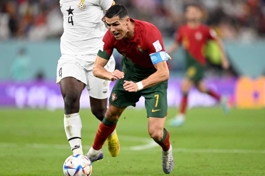 Cristiano Ronaldo went down after a tackle by Mohammed Salisu to win a penalty for Portugal