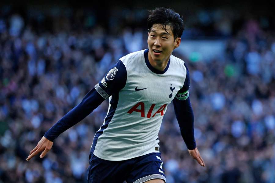  Son Heung-Min celebrates after scoring Tottenham's fourth goal