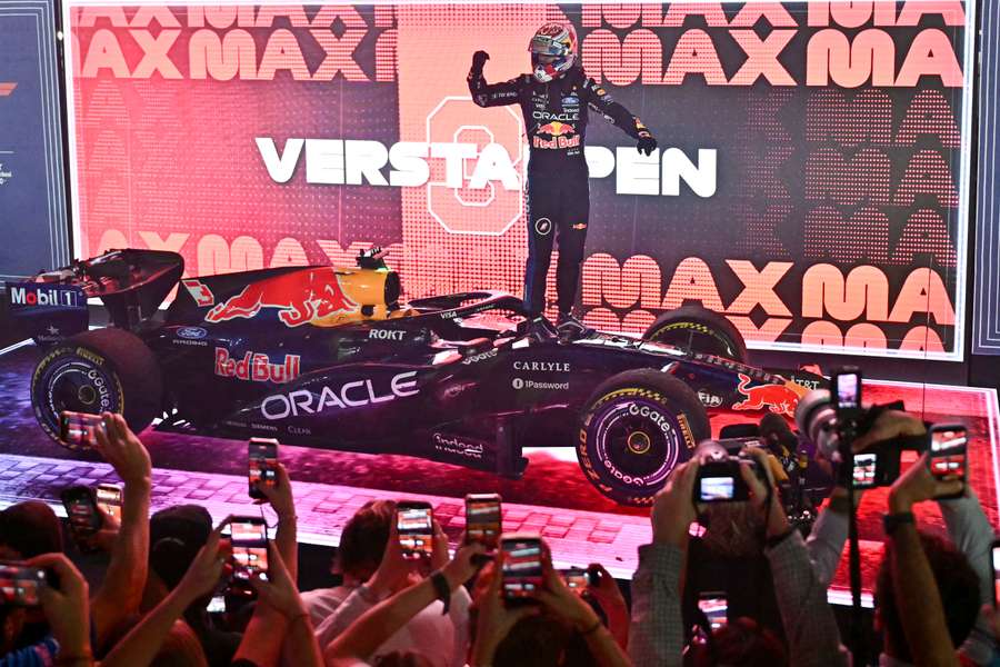 Red Bull Racing's Dutch driver Max Verstappen celebrates winning the Formula One Singapore Grand Prix at the Marina Bay Street Circuit in Singapore Red Bull Racing's Dutch driver Max Verstappen celebrates winning the Formula One Singapore Grand Prix at the Marina Bay Street Circuit in Singapore