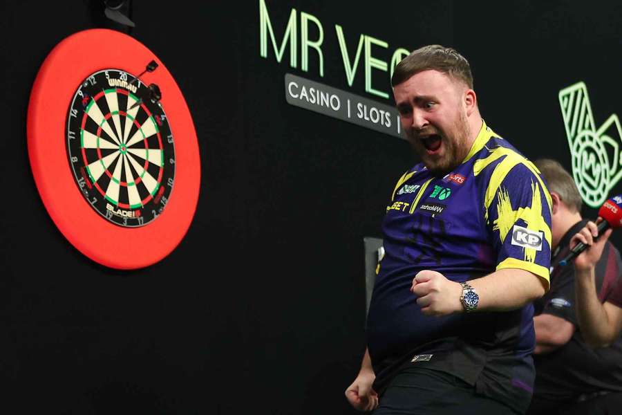 New world number one Littler hammers Humphries to retain Grand Slam of Darts New world number one Littler hammers Humphries to retain Grand Slam of Darts